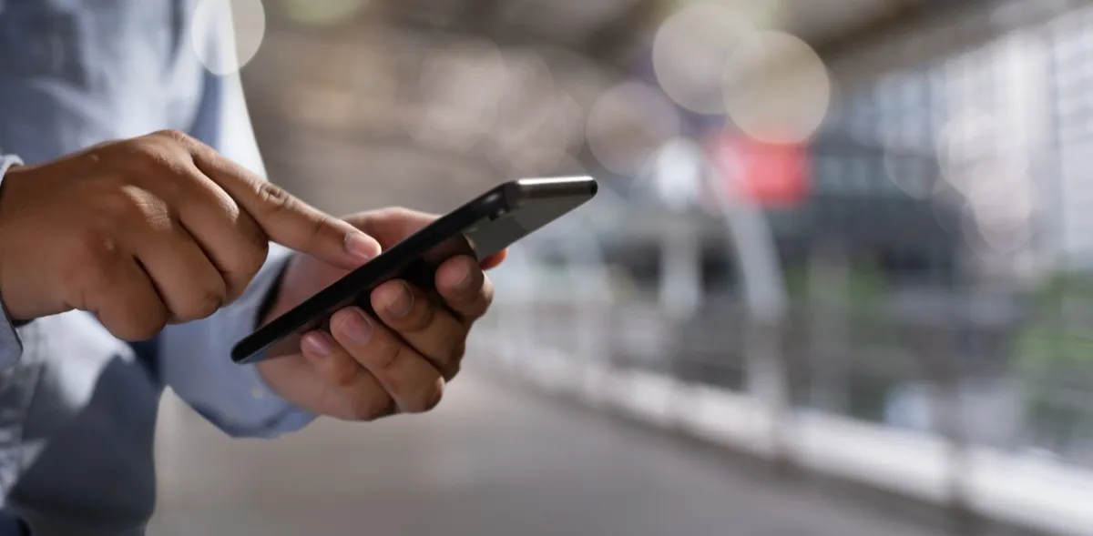Business professional using mobile phone for work calls